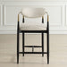 Moxie Counter Stool - matte black wood frame with brushed brass arms and off white velvet upholstery