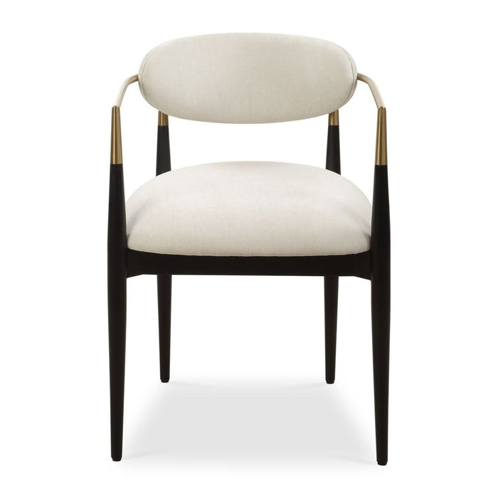 Moxie Dining Arm Chair - matte black wood frame with brushed brass arms and off white velvet upholstery