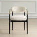 Moxie Dining Arm Chair - matte black wood frame with brushed brass arms and off white velvet upholstery